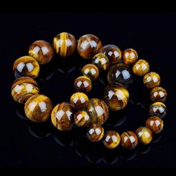 属虎男戴金虎睛石旺财,男属虎的射手座带什么水晶招财